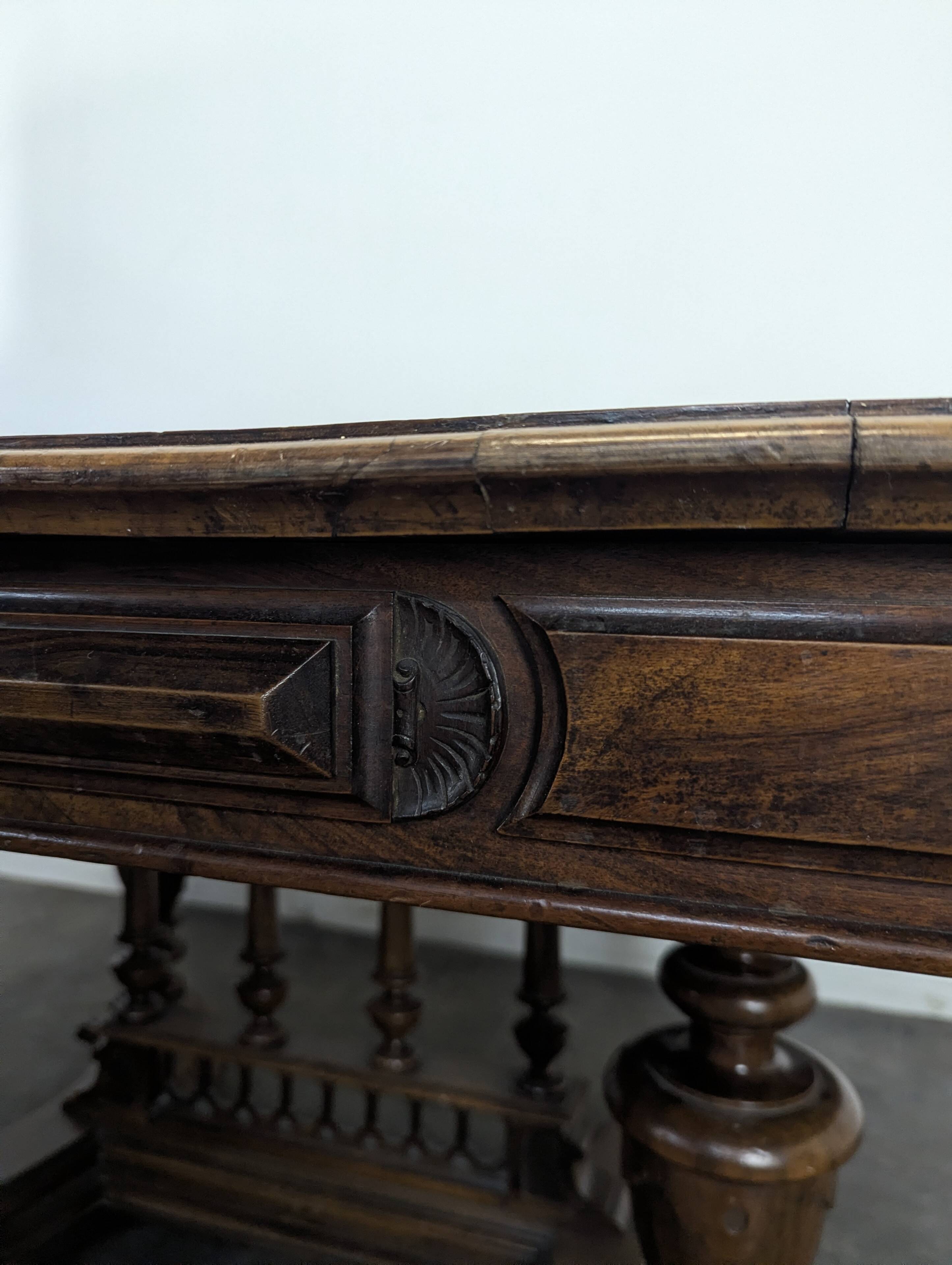 Renaissance-style table in solid walnut