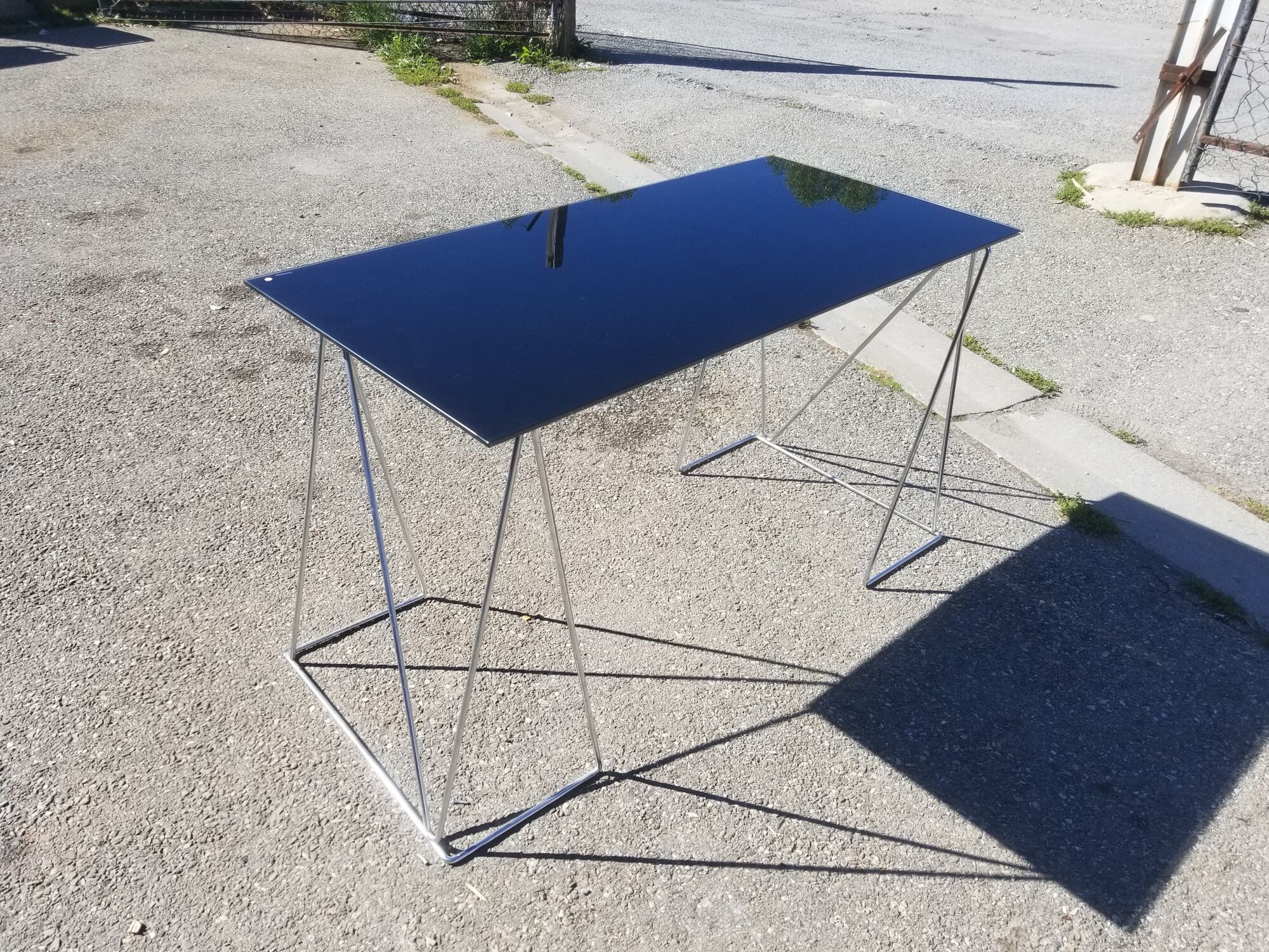 Vintage steel wire desk with chrome trestles and smoked glass top