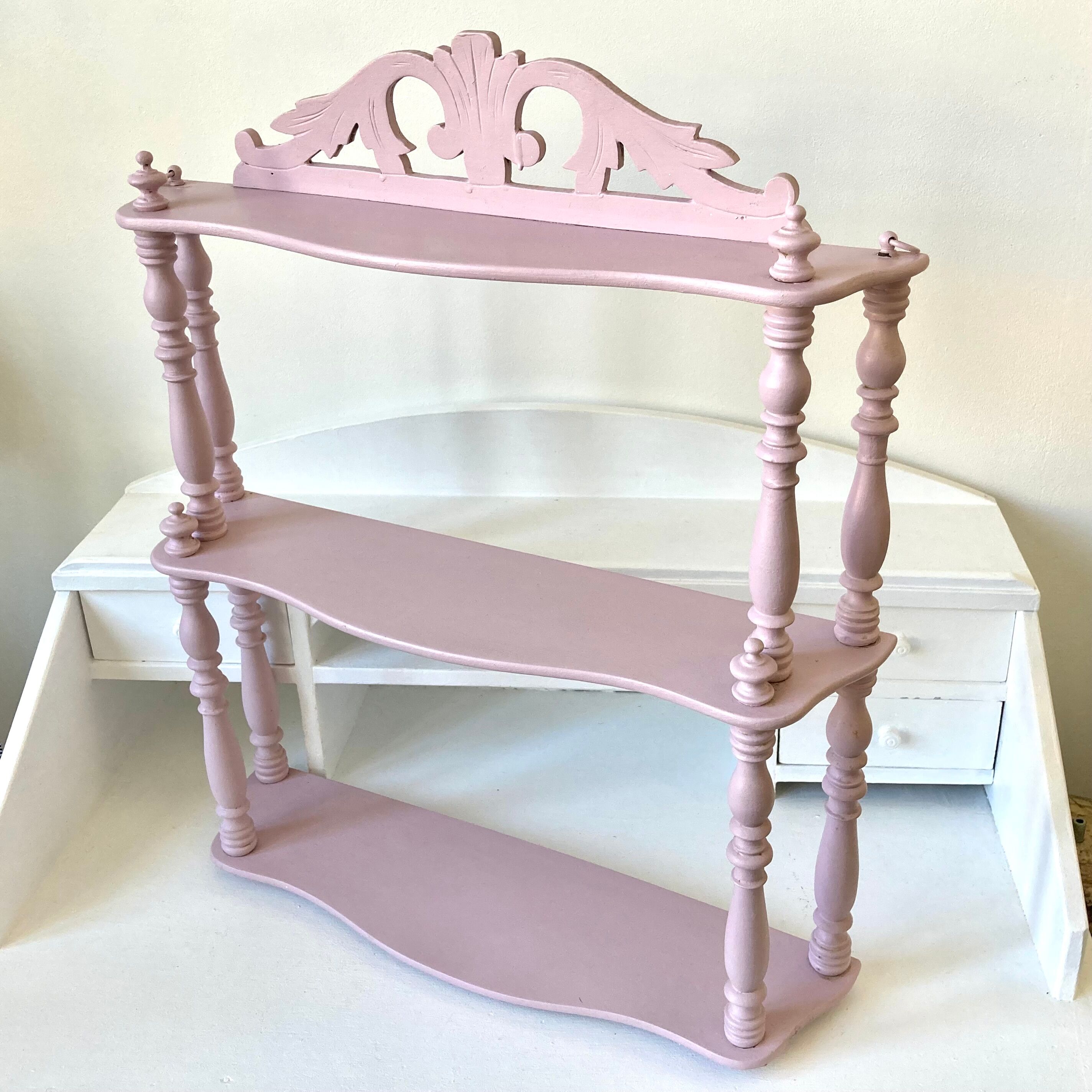 Carved wooden wall shelf