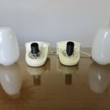 Pair of "streamline" opaline wall lights, France, 1970s-1980s.