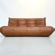 Three-seater Togo sofa in dark cognac leather by Michel Ducaroy for Ligne Roset.