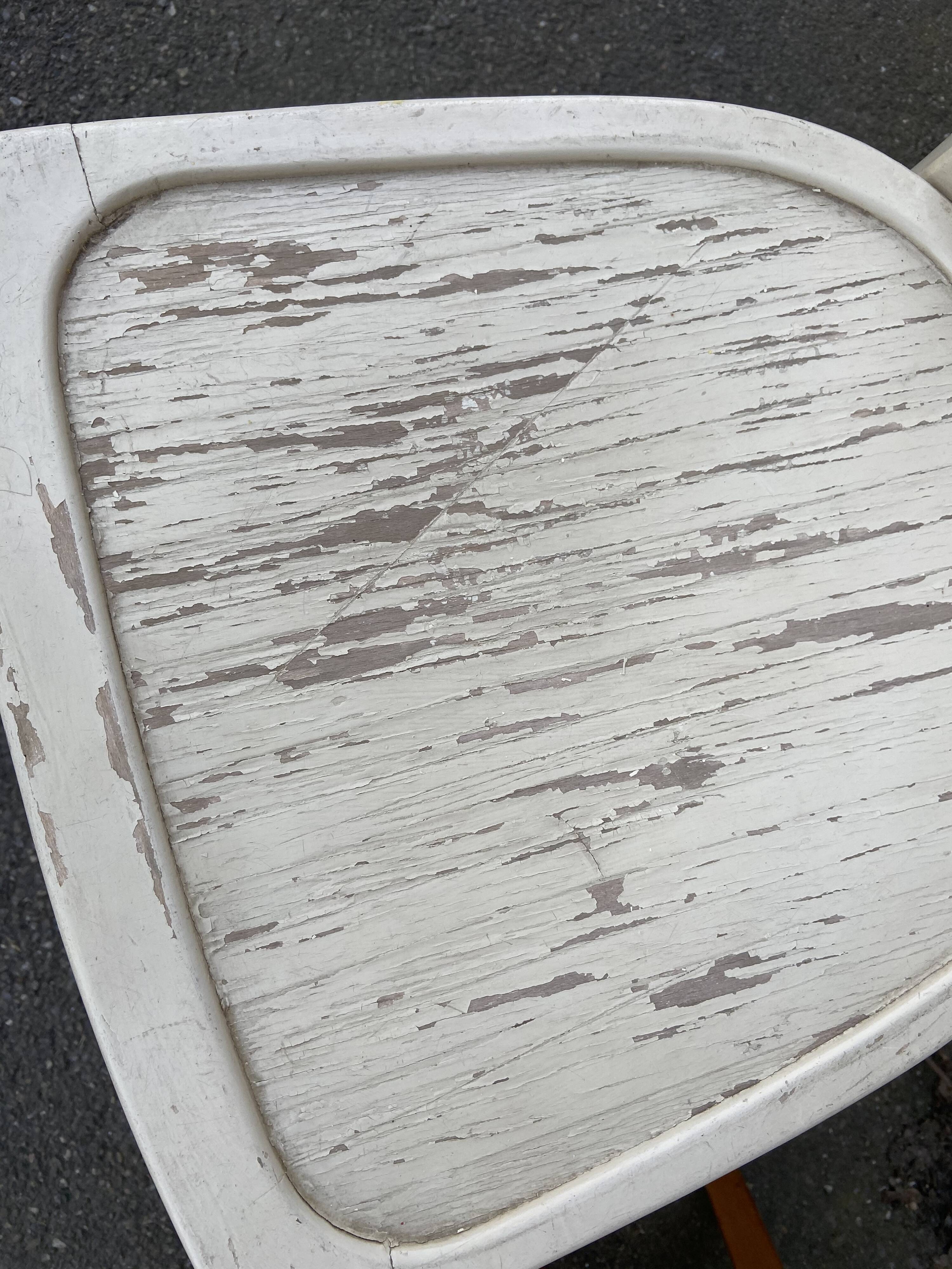 4 mismatched curved wooden bistro chairs