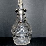 Richly cut crystal decanter and bevelled diamond engraved baccarat or saint-louis? trianon