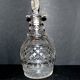 Richly cut crystal decanter and bevelled diamond engraved baccarat or saint-louis? trianon