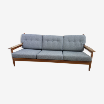 Three seater sofa in fabric and wood