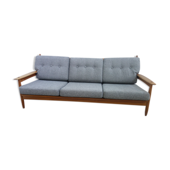 Three seater sofa in fabric and wood