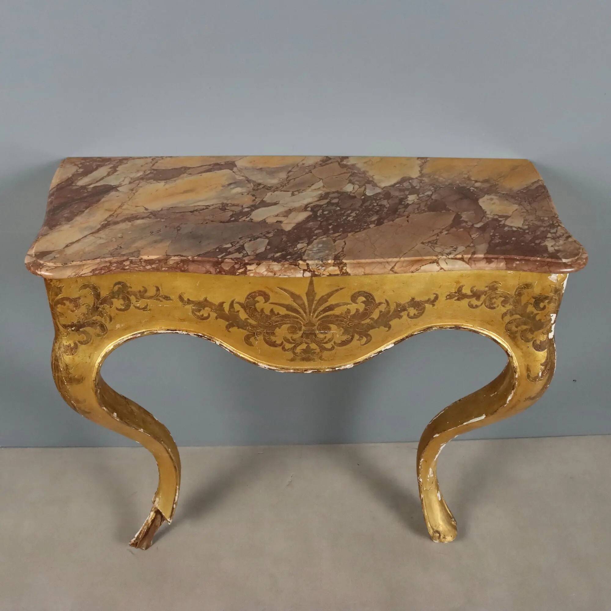 Antique gilded wooden console with marble top, Italy, 19th century.