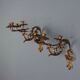 Antique wall sconces in gilded bronze, 20th century, in baroque style.