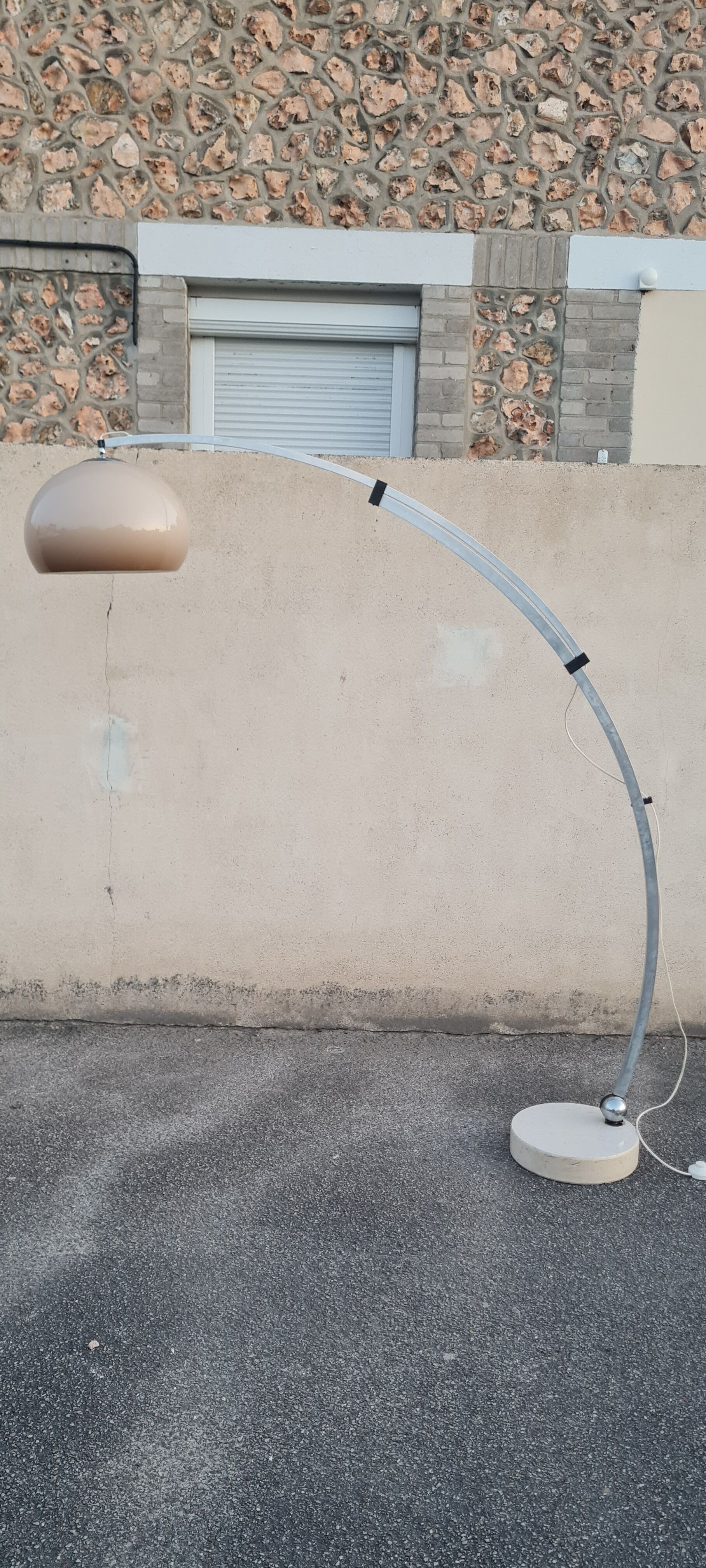 Arch floor lamp by Harvey guzzini 70s