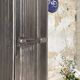 Strafor double-door corrugated iron cloakroom, circa 1920.