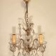 Old baroque chandelier with tassels