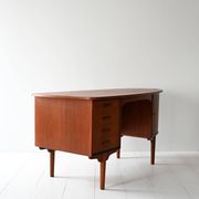 Scandinavian oval desk in teak from the 1960s.