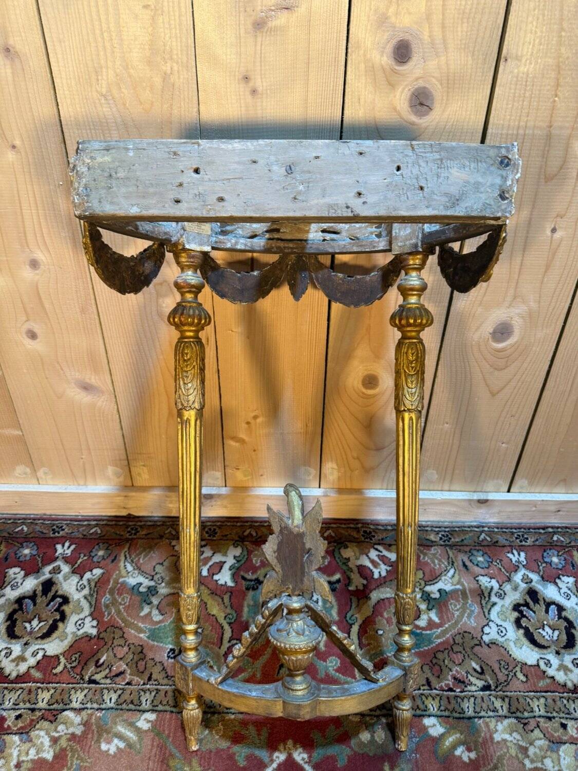 Louis XVI style console in gilded and carved wood