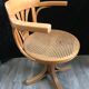 Swivel curved wooden desk armchair