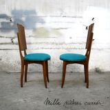 A set of 6 completely renovated turquoise chairs.