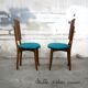 A set of 6 completely renovated turquoise chairs.