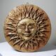 Anthropomorphic sun wall sculpture in patinated terracotta, vintage Italian craftsmanship.