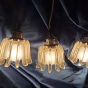 3 suspensions Doria en verre ambré, années 1960