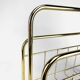 Graphic magazine holder in golden brass 70s