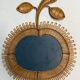 Rattan mirror in the shape of an apple from the 1960s Italy.
