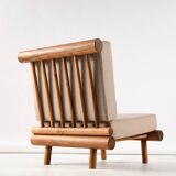 Pair of low chairs called La cachette selected by Charlotte Perriand