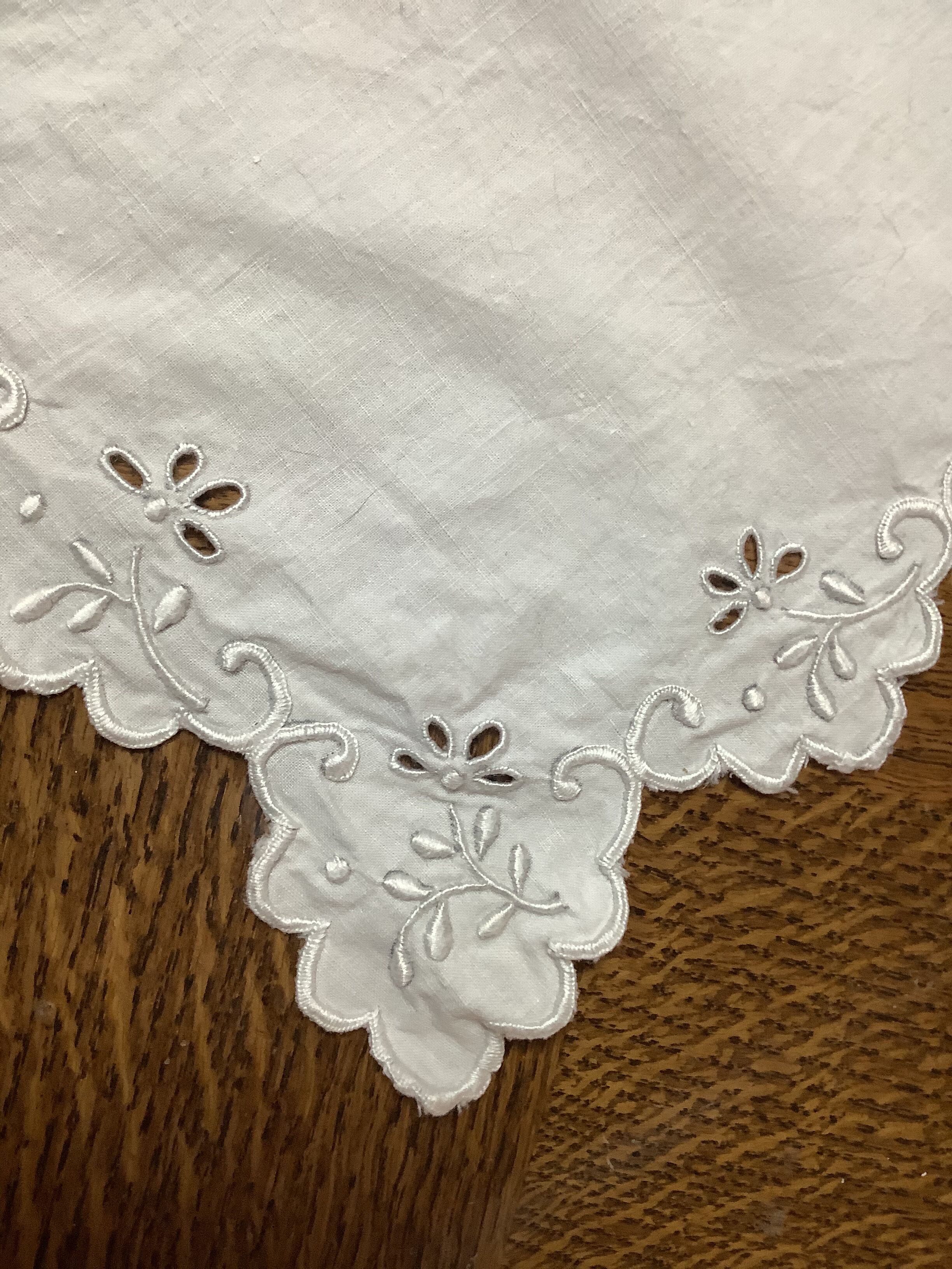 Embroidered table placemat with initials AW