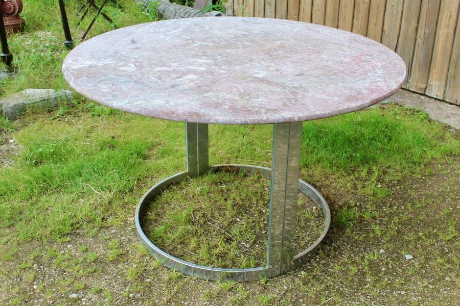 Round marble table with chrome base.