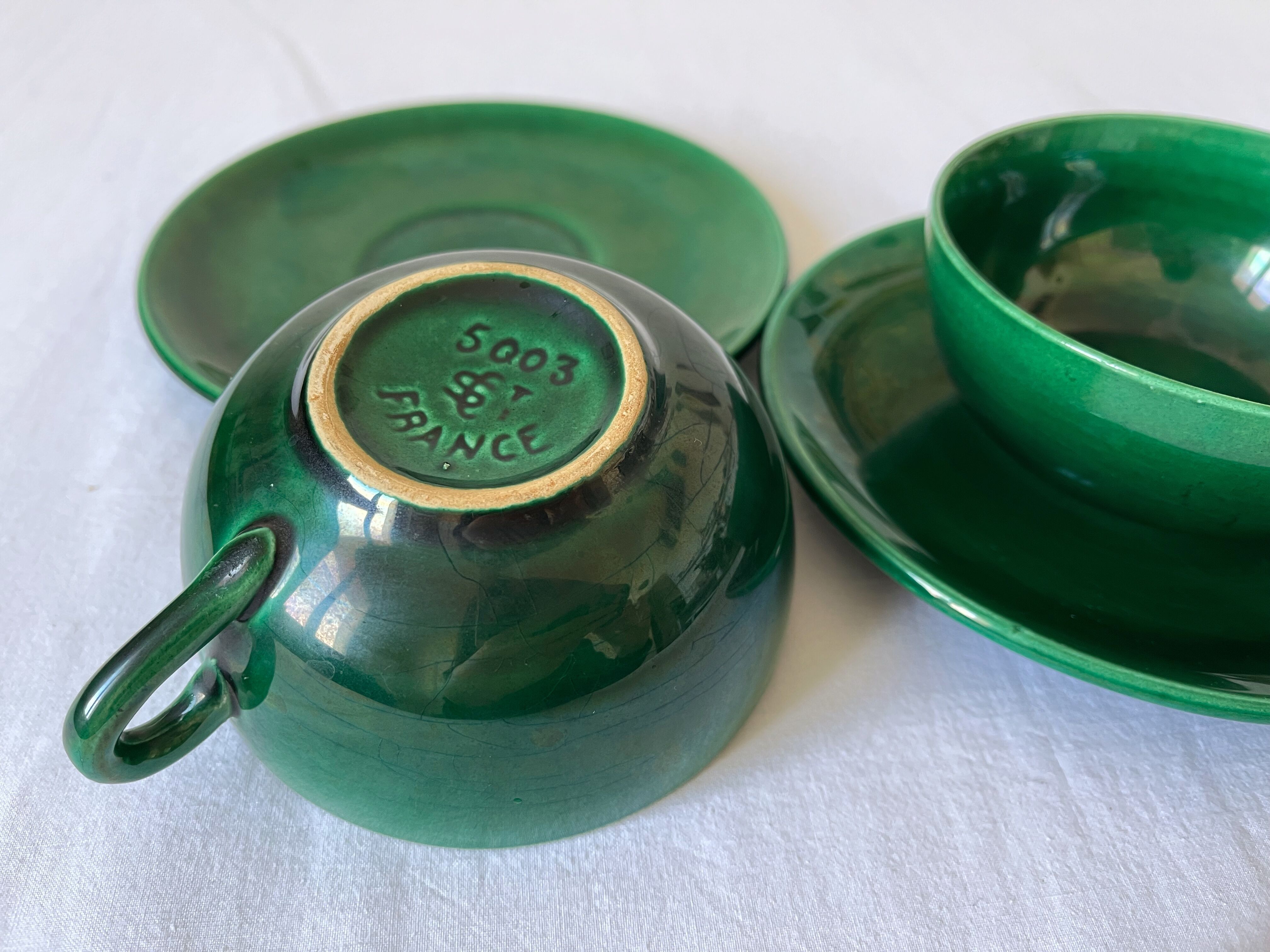 2 old green coffee cups in earthenware of Saint Clement