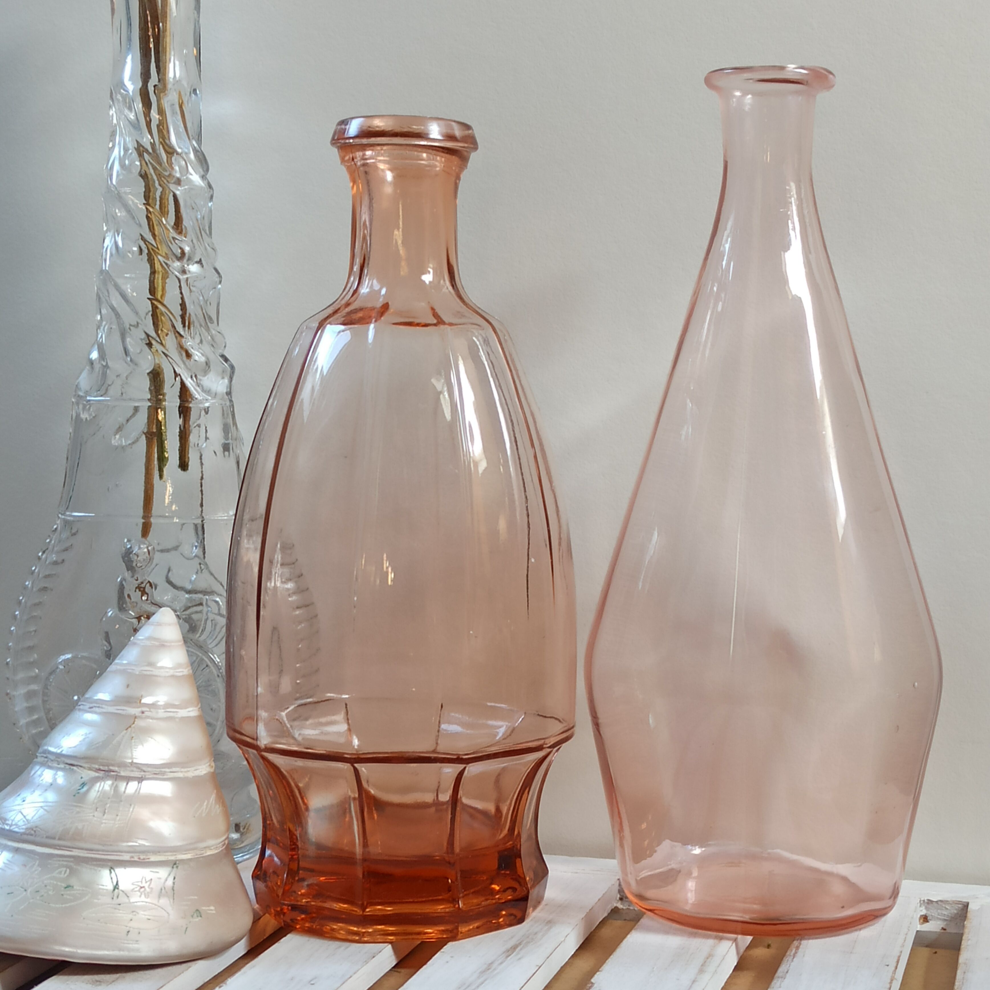 Vintage pink glass bottle vases