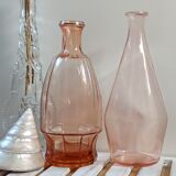 Vintage pink glass bottle vases