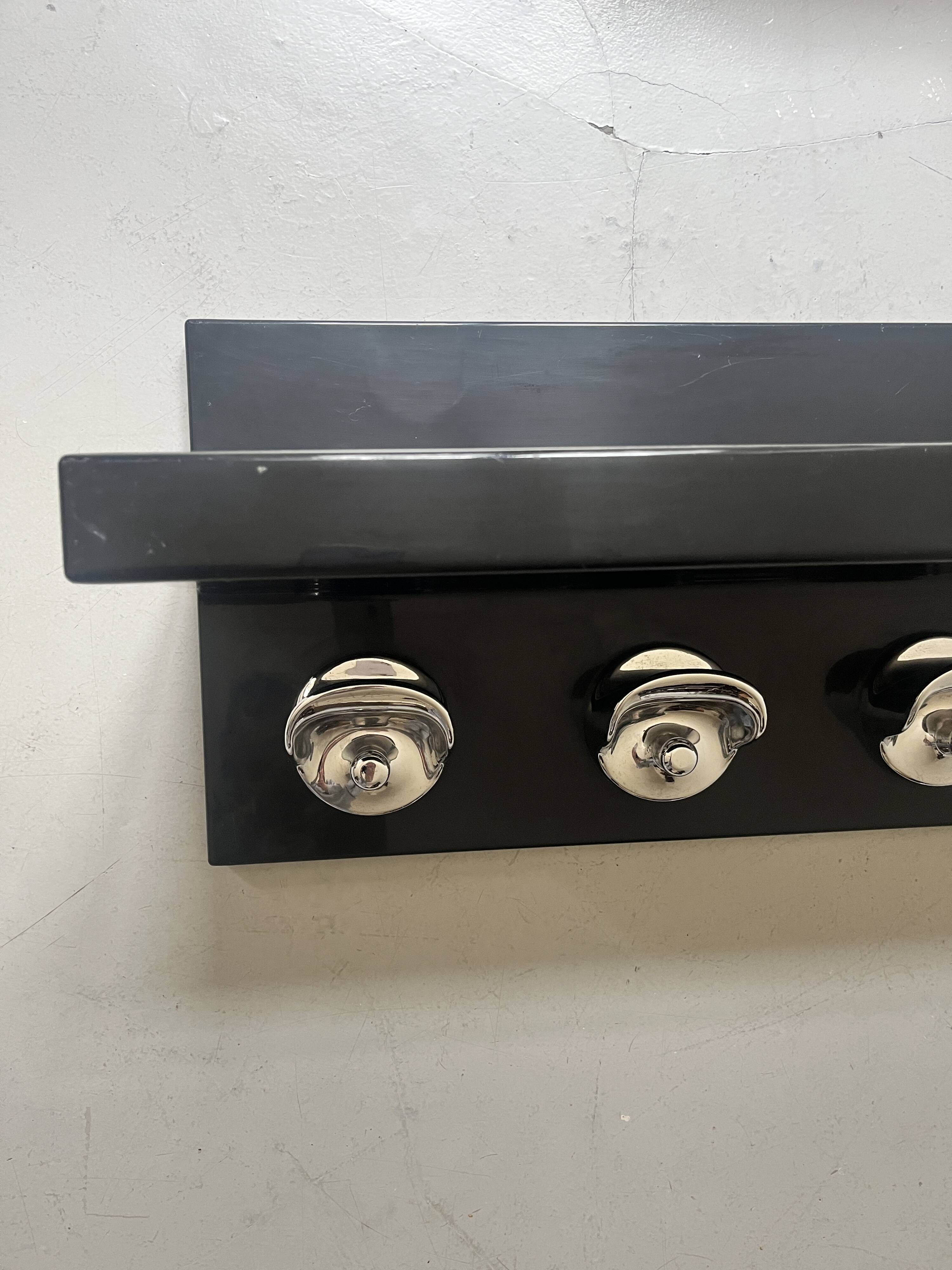 Large black magazine rack by Giotto Stoppino for Kartell, Italy 1970.