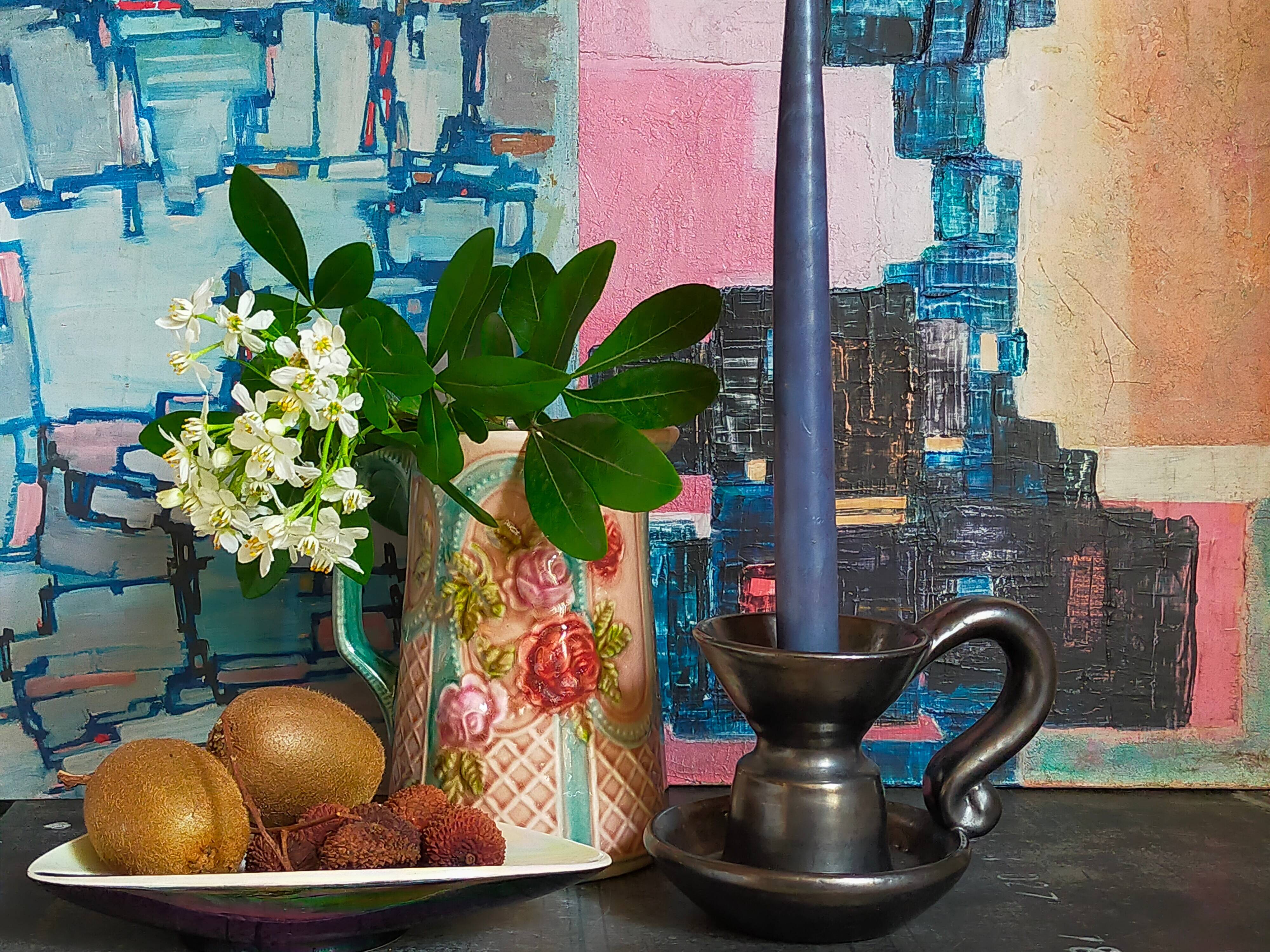 1950s iridescent black ceramic hand candle holder