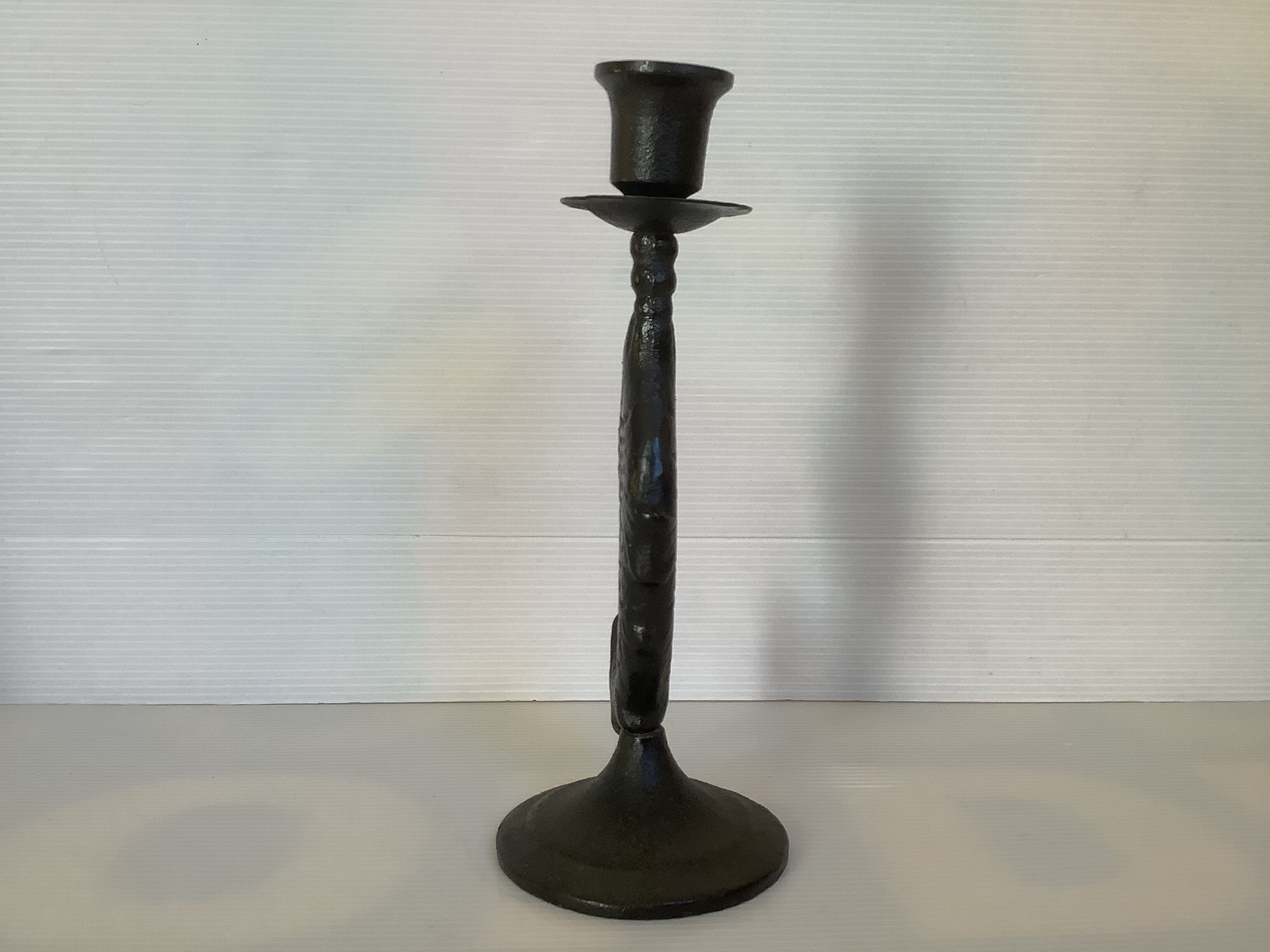Brutalist black cast iron fish candle holder