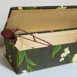Box padded with old fabric