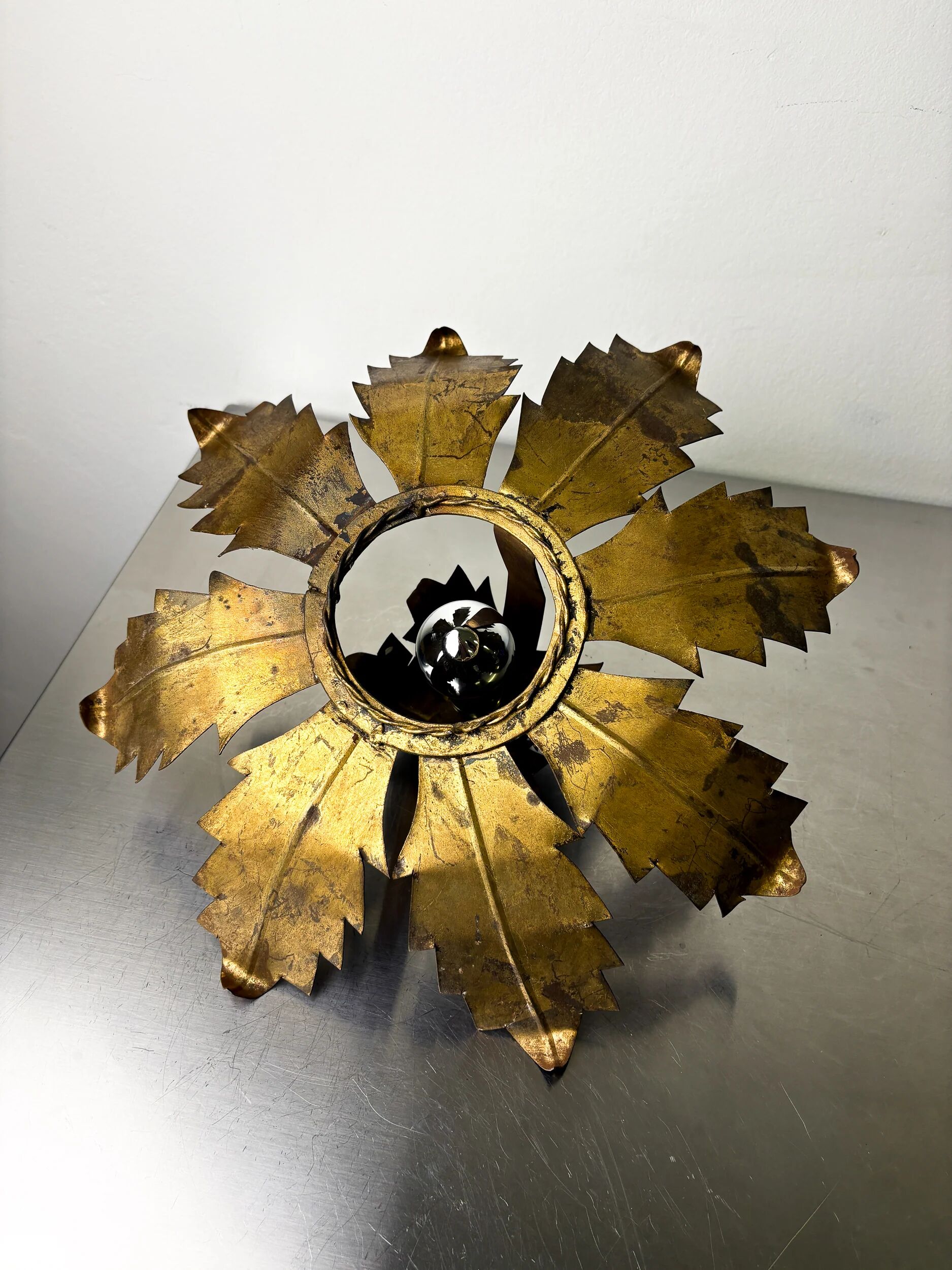 Spanish sunburst flush mount light fixture in gilt iron, circa 1970s