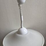 Suspension of the 80s in perforated white metal