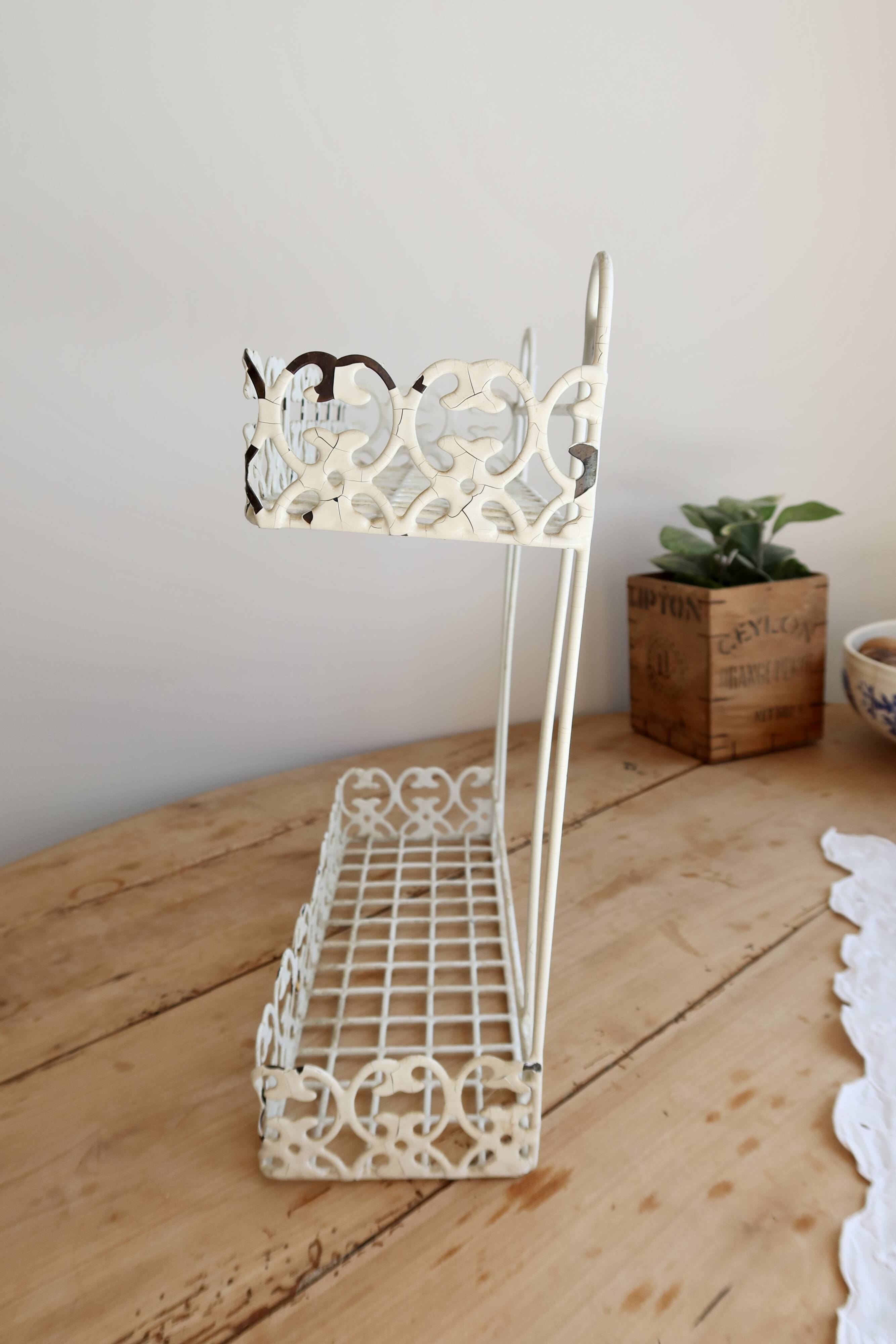 Vintage ivory patinated metal wall shelf