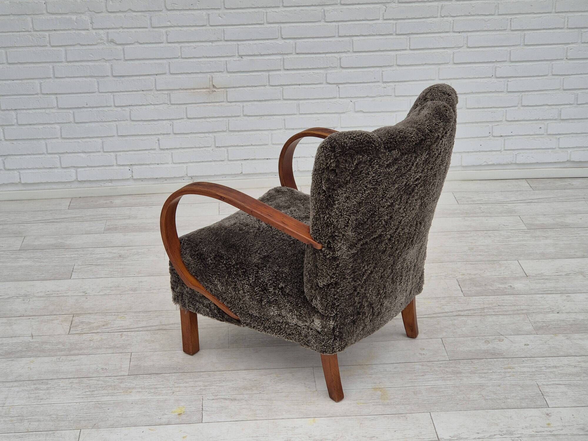 1950s, Danish design, reupholstered armchair, genuine sheepskin "Wellington".