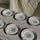 Set of 6 vintage dessert plates made in Poland with a plant motif.