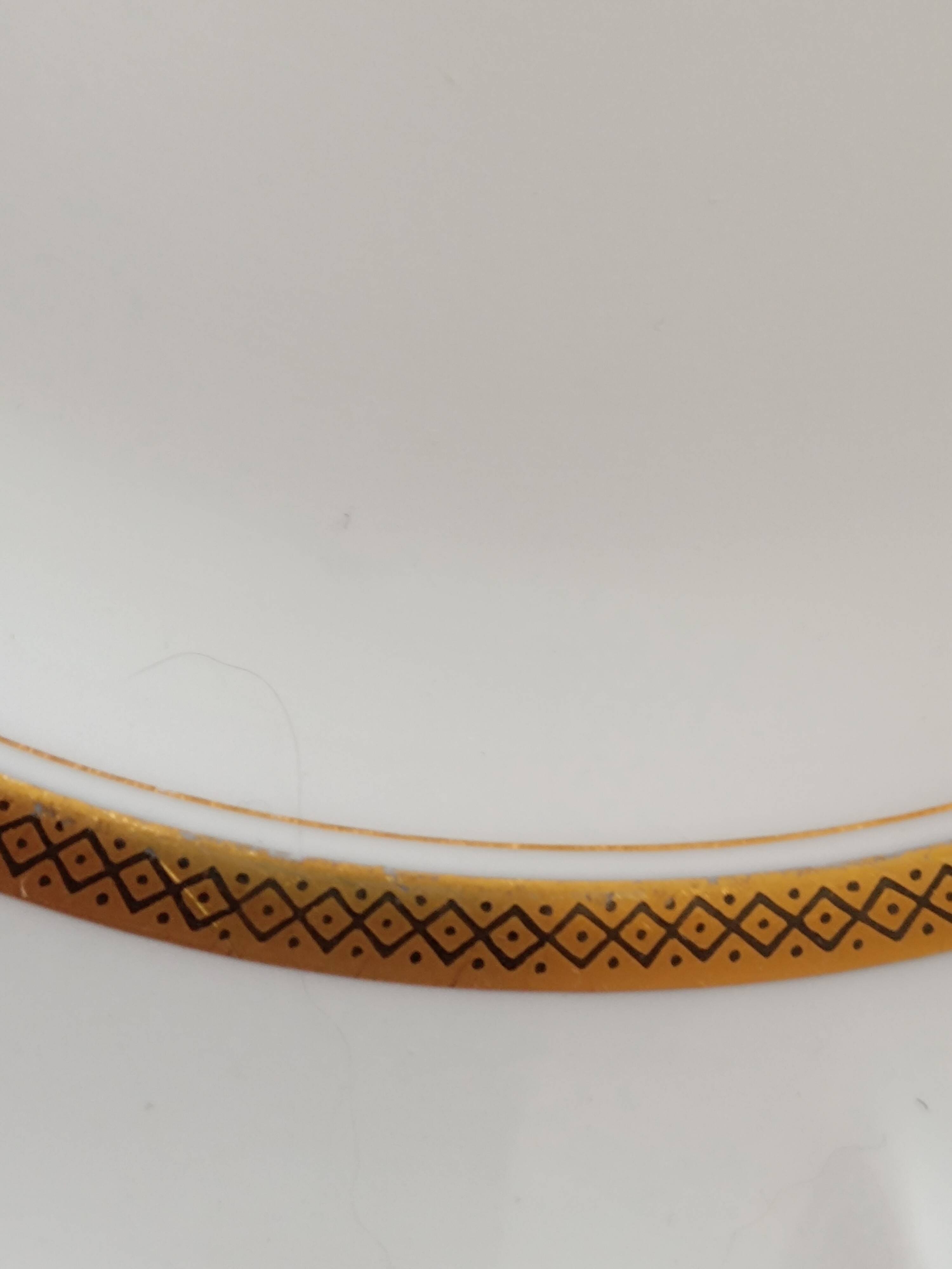 6 Limoges France dinner plates. White, matte gold edging. R; Leclair.