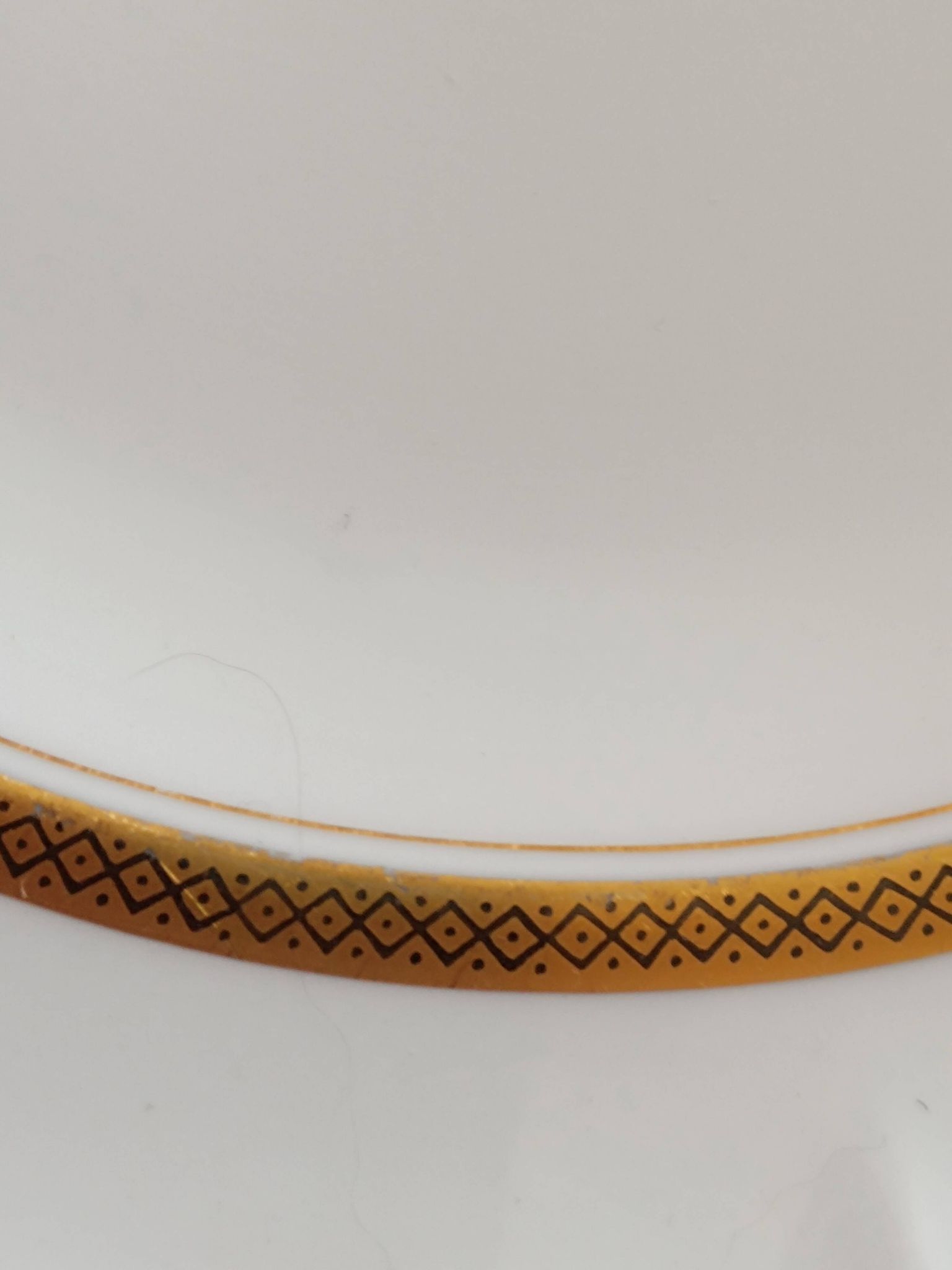 6 Limoges France dinner plates. White, matte gold edging. R; Leclair.