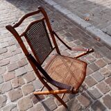 Bamboo folding chair and caning, leather and brass