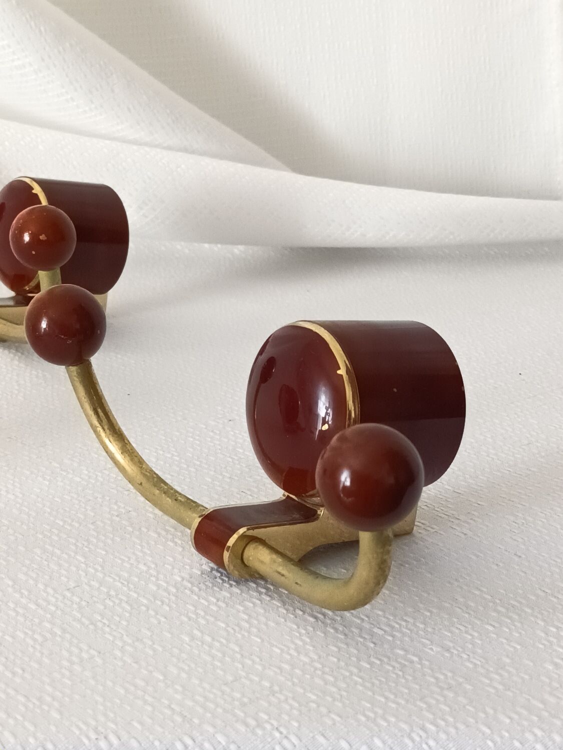 Art deco bakelite brass hooks