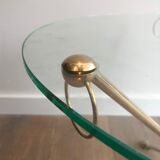 Round coffee table of neoclassical style in brass