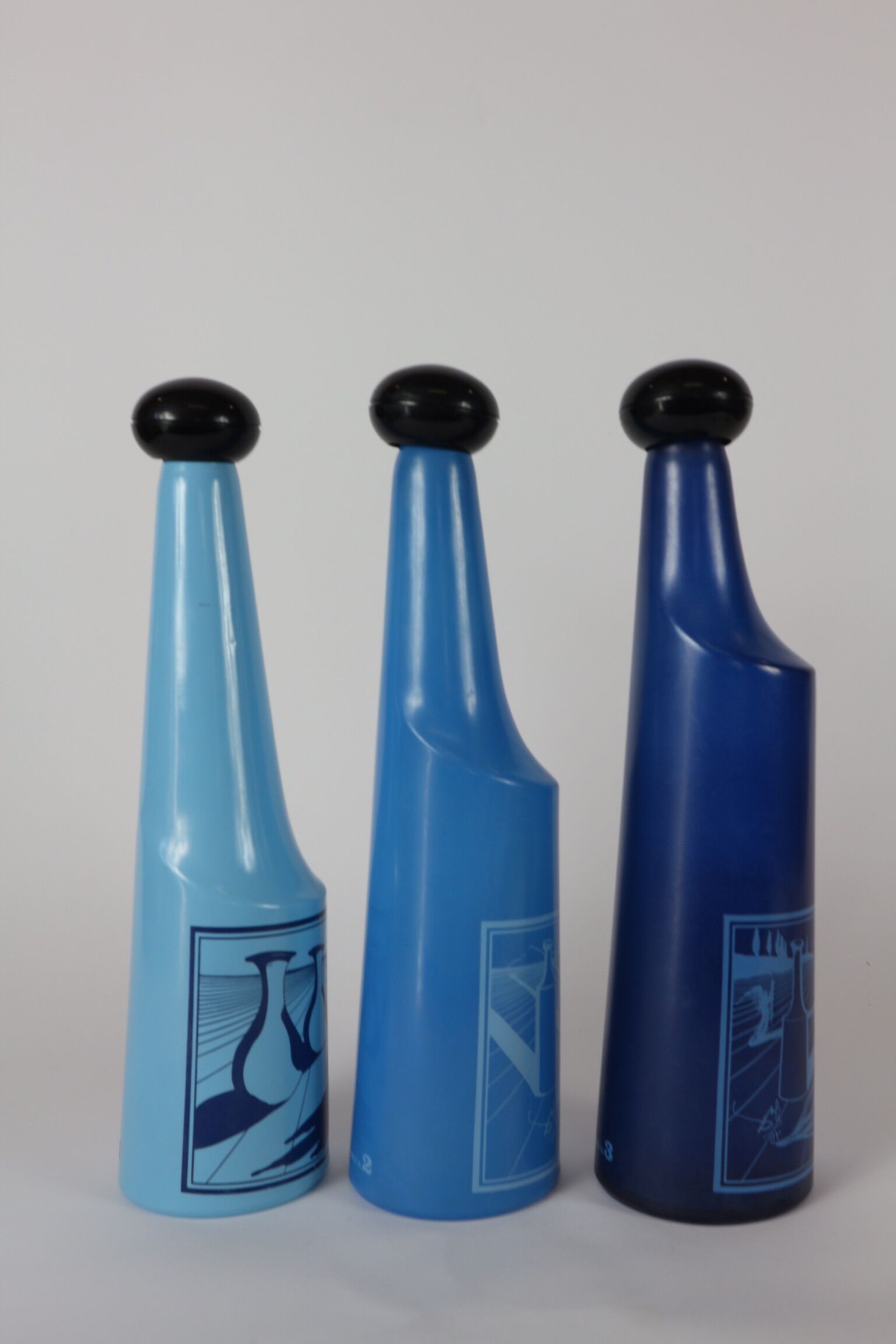 three blue bottles by Salvador Dali for Rosso Antico