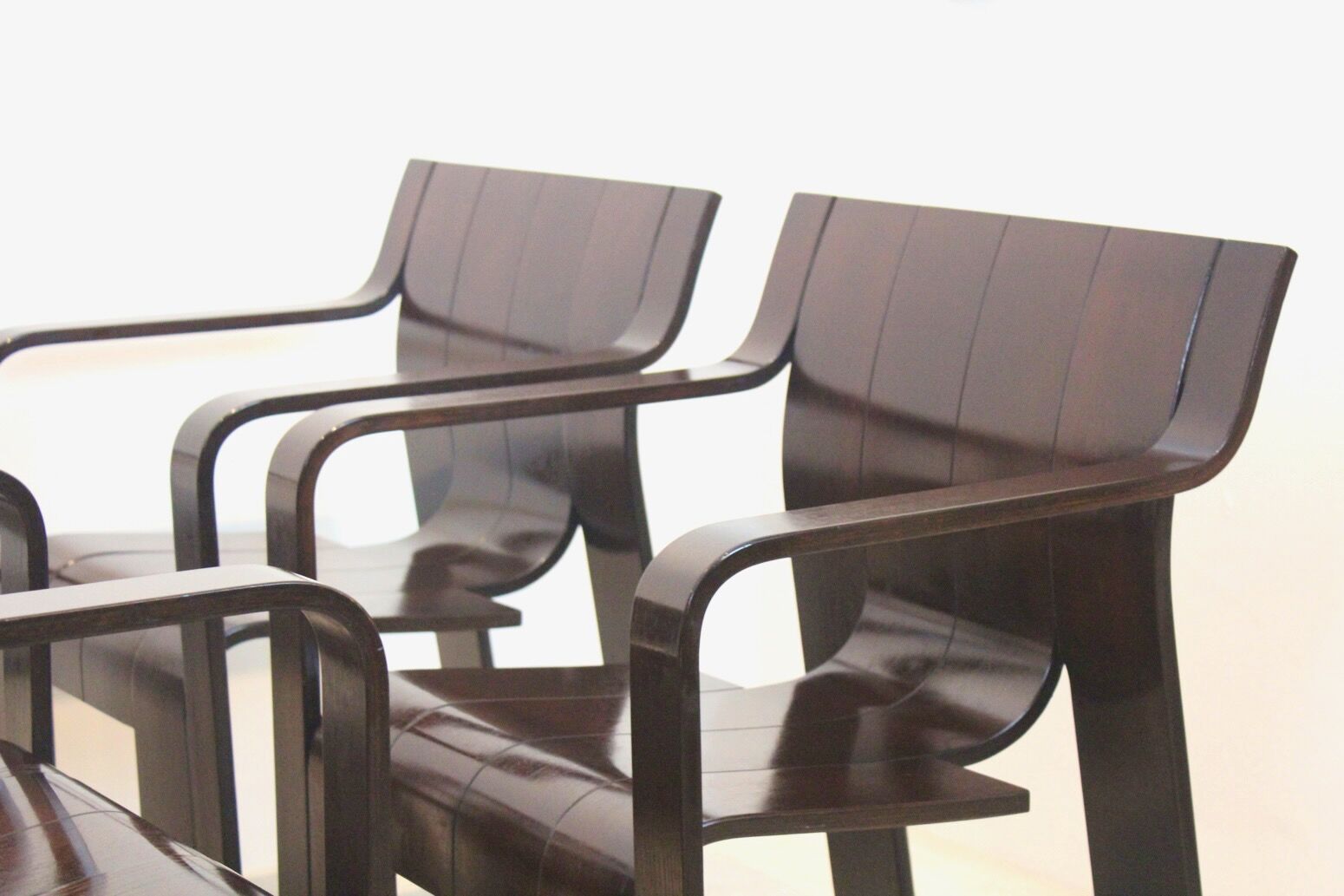 Set of four Strip dining chairs with dark brown ash armrests by Gijs Bakker for Castelijn