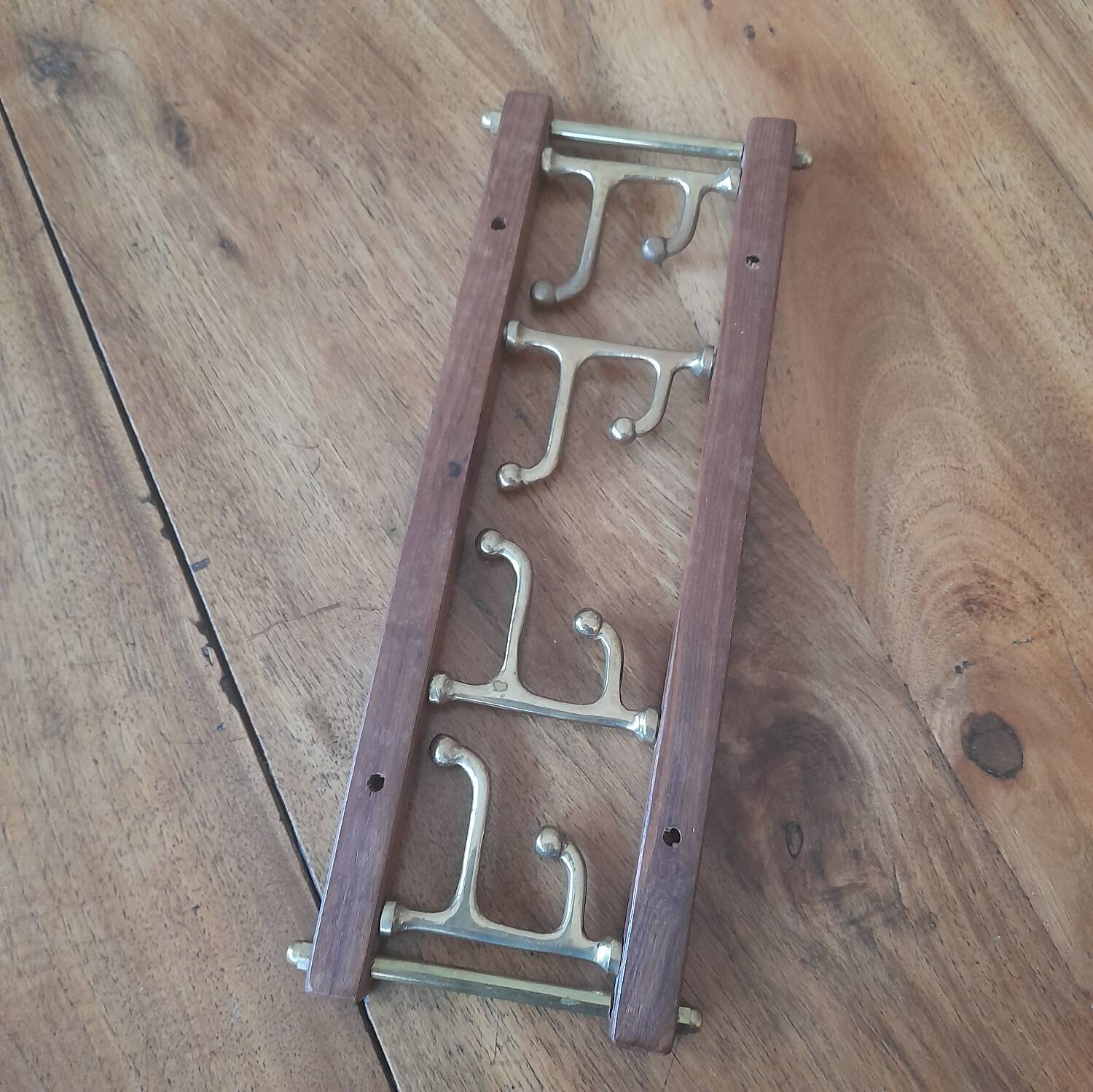 Brass coat hooks