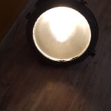 Old brass boat headlight with Holophane interior glass