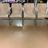 1 lot of 4 white leather office chairs