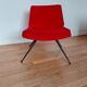 Vintage red faux fur armchair with black metal legs.